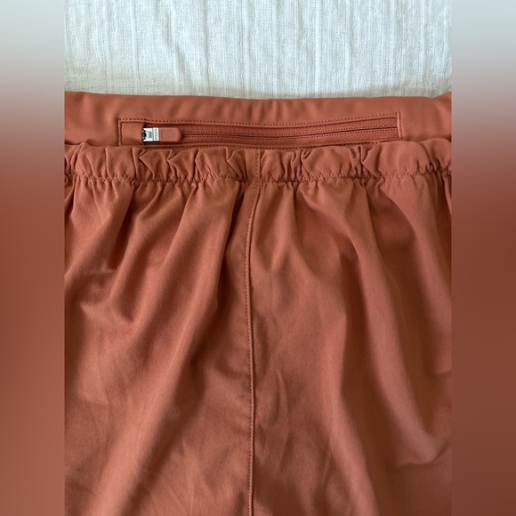 Athleta Mile Marker Burnt Orange 2-1 Shorts | XS - Picture 4 of 8